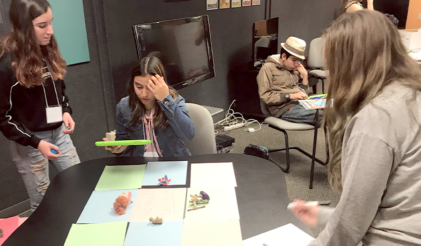 Students working on a project together