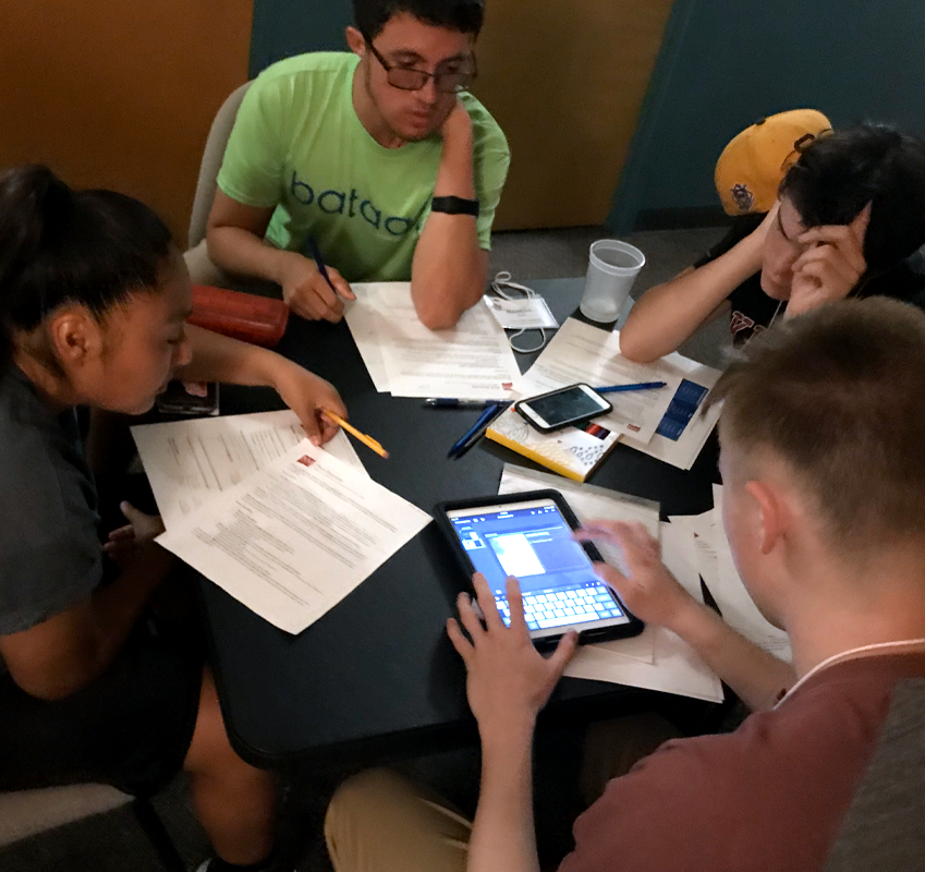 Students working on a project together